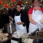 Samples from Fritz Creek General Store — served by Sean Maryott, Hilda Caraballo and Kappi Hansen — make it clear why that establishment is so popular.-Photo by McKibben Jackinsky, Homer News