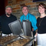 Land’s End Resort-Chart Room Restaurant’s executive chef Billy Roberson, director of hospitality Darrel Oliver and, from the resort’s human resource office, Christina Fenner offer melt-in-your-mouth servings of elk meatloaf atop a potato pancake.-Photo by McKibben Jackinsky, Homer News