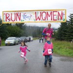 First walkers to cross the finish line: Derek Bynagle with daughter Etta and son Johannes-Photo by McKibben Jackinsky,  Homer News