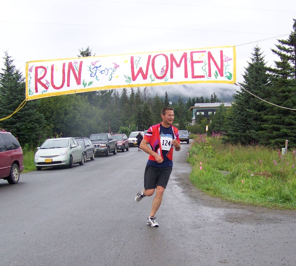 Mike Peterson is the first runner to complete the 5-mile Breast Cancer Run on Sunday, finishing in a time of 34:51:00.-Photo by McKibben Jackinsky,  Homer News