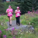 Runners Alivia Erickson, left, and Melinda Erickson head to the finish line of Sunday’s Breast Cancer Run. -Photo by McKibben Jackinsky,  Homer News