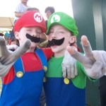 Ben “Mario” Rainwater and Judah “Luigi” Rainwater enjoy themselves at the community event.-Photo by McKibben Jackinsky, Homer News