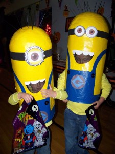 Who you calling "despicable?" Me? Brothers Jaxon and Zayne Adams show off thier mom-made minions costumes at Chapman School's Halloween carnival.-Photo by McKibben Jackinsky, Homer News