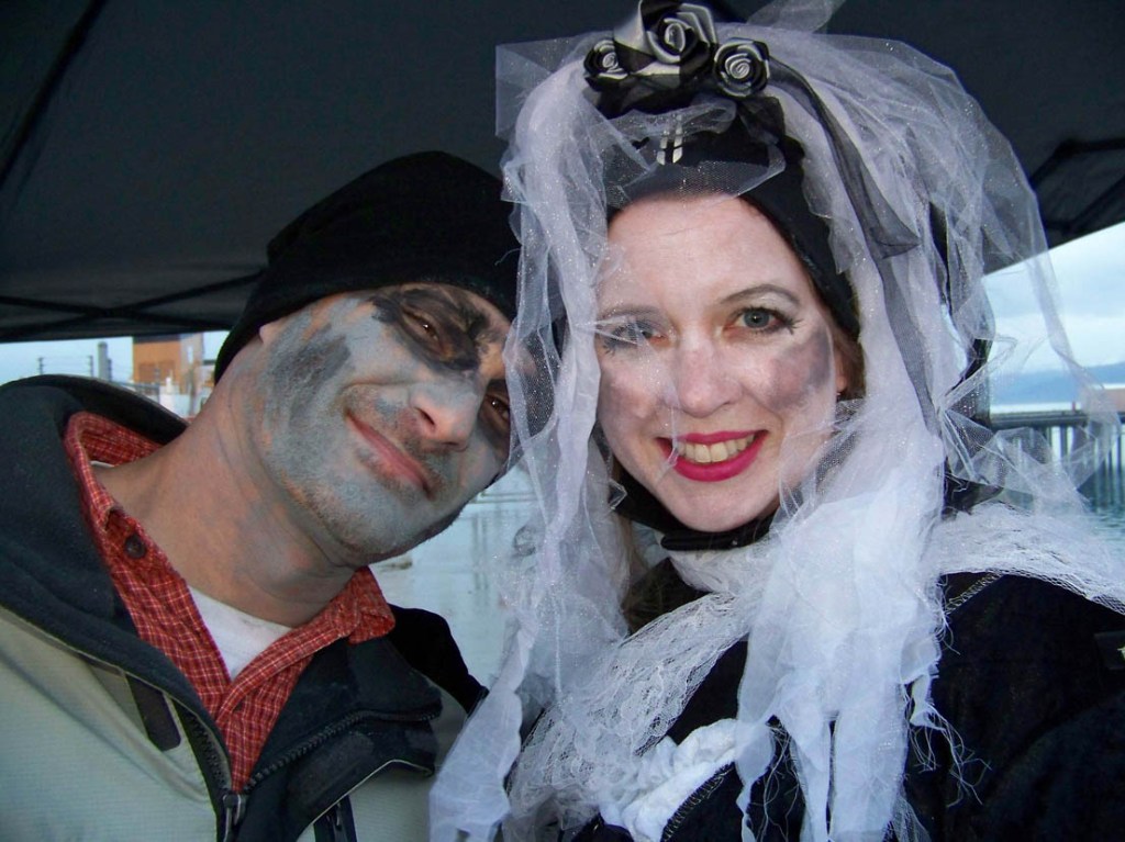 EMC Jim Cotton, an electrician aboard the USCGC Hickory, and his wife, Linne, got into the spirit of Halloween to welcome guests aboard the Haunted Hickory.-Photo by McKibben Jackinsky, Homer News