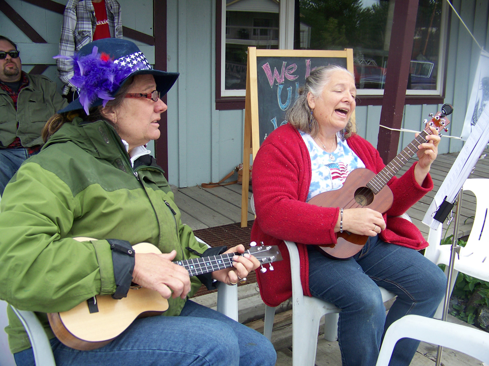 Homer Volunteer Fire Department is a colorful start to the Fourth of July parade along Pioneer Avenue. -Photo by McKibben Jackinsky, Homer News