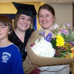 Surrounded by her brother Daniel, left, and sister Elikonida, right, valedictorian and student speaker Nina Reutov celebrates receiving her associate of arts degree at Kachemak Bay Campus’ May 8 commencement ceremony. -Photos by McKibben Jackinsky, Homer News