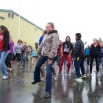 Students of Vergine’s Dance Studio surprise the crowd with a flash mob performance of “Gangnam Style.”-Photo by McKibben Jackinsky, Homer News