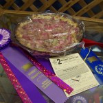 Emily Coble's rhubarb pie took blue first-place and purple division-champion ribbons in the 9- to 13-year-old division at the Kenai Peninsula State Fair-Photo by McKibben Jackinsky, Homer News