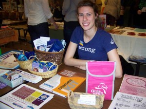 Tara Schmidt of Haven House offers information about Girls On the Run during Saturday’s Rotary Health Fair.-Photo by McKibben Jackinsky, Homer News