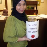 Homer High School exchange student Yusra Sahi of the Philippines is collecting donations to support Philippine Red Cross’s aid to victims of Typhoon Haiyan.  -Photo by McKibben Jackinsky, Homer News