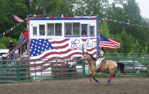 Ninilchik rodeo family camaraderie is evident in each event, whether it’s a young cowboy experiencing the thrill of calf riding, a bull rider trying to hang on for eight seconds, or the two-member teams in the roping competitions.-Photo by McKibben Jackinsky, Homer News