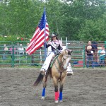 Ninilchik rodeo family camaraderie is evident in each event, whether it’s a young cowboy experiencing the thrill of calf riding, a bull rider trying to hang on for eight seconds, or the two-member teams in the roping competitions.-Photo by McKibben Jackinsky, Homer News