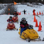 Youngsters take part in the Snow Rondi snowmachine activites. -Photo by McKibben Jackinsky, Homer News