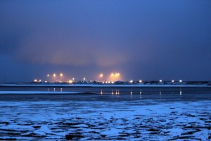 The Homer Spit is reflected in Mud Bay as seen from the Spit Trail early Sunday morning.-Photo by McKibben Jackinsky, Homer News