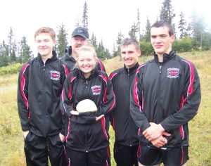 Nikolaevsk’s Jonah Fefelov, Coach Steve Klaich, Megan Hickman, Nicetas Lasiter, Greg Trail took first place in junior varsity competition.-Photo by McKibben Jackinsky, Homer News
