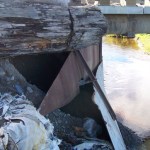 As in previous years, rain has caused damage to abutments of the Tall Tree Avenue bridge across Stariski Creek.-Photo by McKibben Jackinsky, Homer News