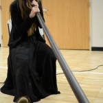 Homer singer/songwriter Shawn Zuke plays the didgeridoo during a CD release concert on Sunday, Dec. 20, 2015 at the Sterling Community Center in Sterling, Alaska.