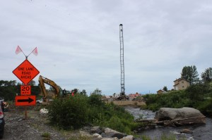 Traffic into and out of Ninilchik is currently being rerouted across a temporary bridge spanning Ninilchik River while work on a new bridge is underway.-Photo by McKibben Jackinsky, Homer News