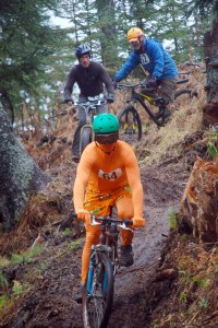 Michael McGuire comes down a muddy hill during the Halloween Hustle on Sunday at the Diamond Creek Demonstration Trail.-Photo by Michael Armstrong, Homer News