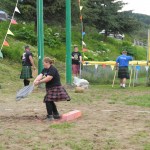 Breanna Love tosses the halibut, a unique to Homer event. Love won the women’s halibut toss. -Photo by Michael Armstrong, Homer News