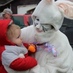 Jaxton Doughty, 1, and the Easter Bunny share a quiet moment.-McKibben Jackinsky