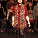 Chloe Pleznac sings "If I Could've Been," the opening song in the second act of Working: A Musical, with the rest of the cast behind her. The song explores the dreams of the working class characters who wish they had acheived more. -Photo by Anna Frost, Homer News