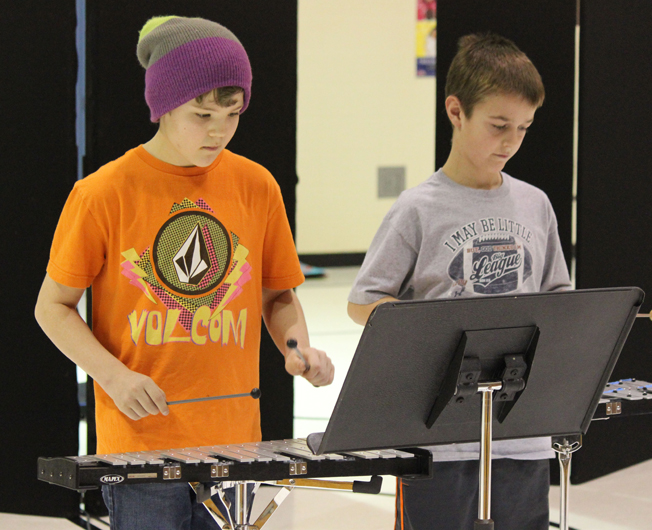 Musicians Phin Weston and Clayton Beachy play “Bells Medley”-Photo by McKibben Jackinsky, Homer News