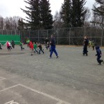 Homer High School students Ian Lowe, Sheldon Hutt and Patrick Rainwater officiate a game of football at Paul Banks Elementary School last week.-Photo provided
