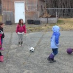 Sam Draves of Homer High School plays soccer with Iris O’Laire and Charity Rainwater. -Photo provided