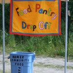 A box at the Farmers Market collects donated garden food.-Photo by Toni Ross