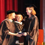 Jill Burnham receives her degree from Kachemak Bay Campus Director Carol Swartz at KBC’s May 4 graduation. Burnham moved to Homer in October 2015 and completed her associates degree, which she started in 1981 before pursuing a career in the arts.-Photo by Anna Frost, Homer News