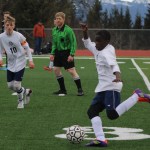 Nouredine Mama prepares to kick the ball across the field in attempt to get it closer to Nikiski's goal. Homer beat Nikiski 4-1 in the home game on Thursday, April 14.-Photo by Anna Frost; Homer News