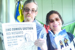 Brian Payne, left, and Skywalker Payne, right, pose with their recent publications.-Photo by Michael Armstrong, Homer News