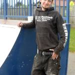 Exalted Ruler Jesse Walton of the Homer Elks Lodge rests on Saturday, July 28, 2018, after he and four other Elks painted the skateboard ramps at the Homer Skate Park by the Homer Educational and Recreational Complex in Homer, Alaska. Walton got a grant to repair the popular park. (Photo by Michael Armstrong/Homer News)