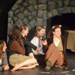Indigo Sonnenborn, far right, rehearses a scene from The Wind in the Willows. Joining her are, from left to right, Thea Person, Esme Golden, Elsa Pietsch and Poppy Smith. The Pier One Youth Theatre play shows Thursday through Sunday, Aug. 9-12, 2018, in Homer, Alaska. (Photo by Michael Armstrong/Homer News)