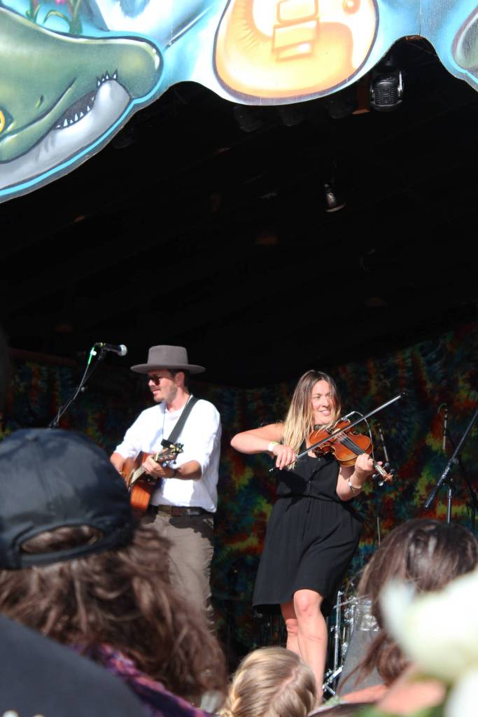 Blackwater Railroad Company, of Seward, performs to a dancing crowd on the Ocean Stage at this years Salmonfest on Saturday, Aug. 4, 2018 in Ninilchik, Alaska. (Photo by Megan Pacer/Homer News)