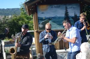 Members of the LowDown Brass Band perform an impromptu session Tuesday Aug. 7, 2018 at the Homer Brewery in Homer, Alaska. The band played at Salmonfest on Saturday, at Alices Champagne Palace on Tuesday and at Soldotna Creek Park on Wednesday. (Photo by Michael Armstrong/Homer News)