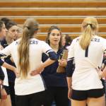 Sara Pennington, the new Homer head volleyball coach, talks to her players during a timeout in one of their games against Kenai Central High School in the Homer Jamboree, held Saturday, Aug. 18, 2018 at the high school in Homer, Alaska. Homer took third in the Jamboree. (Photo by Megan Pacer/Homer News)