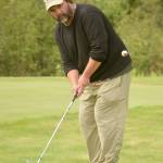 Todd Eskelin chips to the 18th green Sunday, Aug. 12, 2018, at the Donald R. Morgan Memorial Club Championship at Kenai Golf Course. (Photo by Jeff Helminiak)