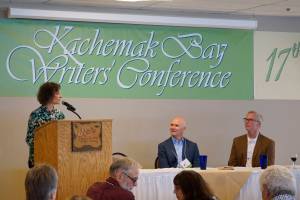 Kachemak Bay Campus Director Carol Swartz, left, speaks June 8, 2018, at the opening of the 2018 Kachemak Bay Writers Conference at Lands End Resort in Homer, Alaska. (Photo by Michael Armstrong/Homer News)