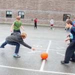 Jaxon Bourne, Sydney Phipps, Steel Seaton and Aiden Clark play a ball game in courtyard during recess on Tuesday, Aug. 18, 2018, the first day of school, at West Homer Elementary in Homer, Alaska. (Photo by Megan Pacer/Homer News)