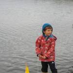 Ike Mitchell runs sea trials on a boat he made during the Kachemak Bay Wooden Boat Society Festival on Saturday, Sept. 2, 2017 at the Nick Dudiak Fishing Lagoon campground in Homer, Alaska. (File photo by Michael Armstrong/Homer News)
