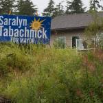 A Saralyn Tabachnick for mayor election sign on Mendenhall Loop Road on Friday, Aug. 24, 2018. Alaska statute states signs on private or commercial property cannot be located within 660 feet of a state-maintained road or with the purpose of their message being read from the main traveled way. (Michael Penn | Juneau Empire)