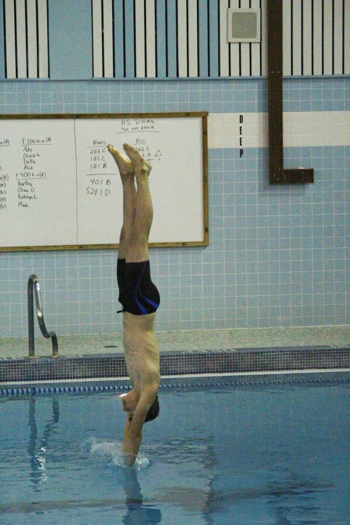 Homers Rio Shermet Pitcher completes a dive during the Homer Quad event Friday, Aug. 24, 2018 at the Kate Kuhns Aquatic Center in Homer, Alaska. (Photo by Megan Pacer/Homer News)