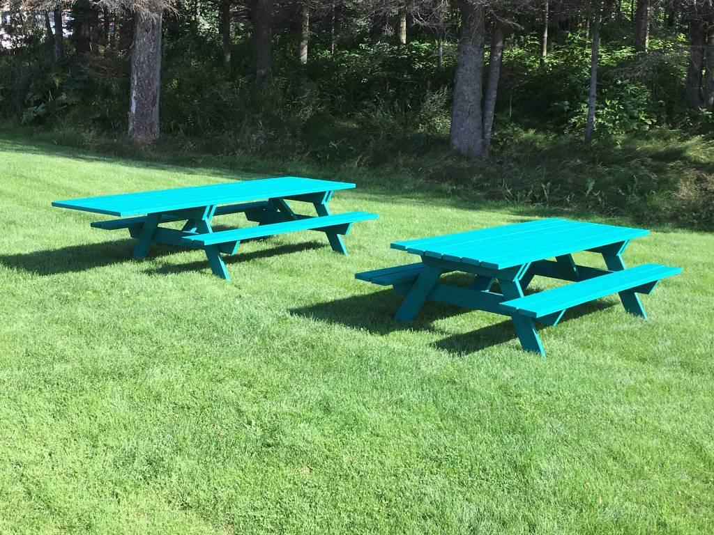 Homer-Kachemak Bay Rotarians built and painted two new picnic tables on Aug. 24, 2018, at a work party at Ben Walters Park in Homer, Alaska. (Photo provided)