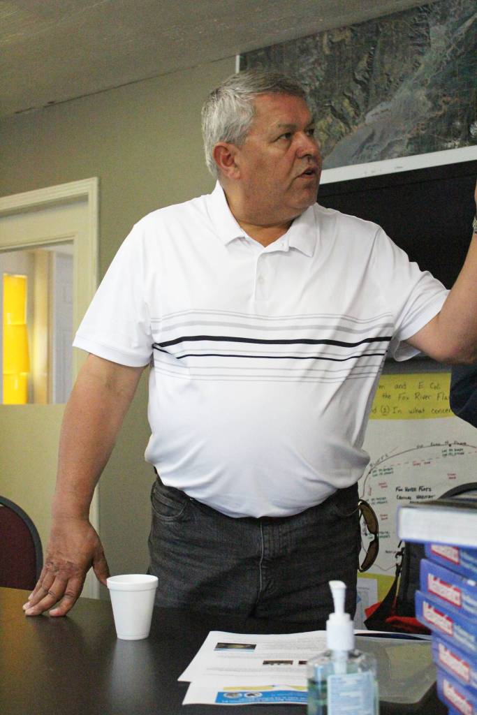 Kenai Peninsula Borough Charlie Pierce speaks to a small crowd of parents and teachers during a community meeting Thursday, Aug. 30, 2018 at the middle-high school building in Kachemak Selo, Alaska. (Photo by Megan Pacer/Homer News)