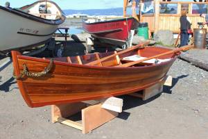 Several wooden boats rest on display Saturday, Sept. 1, 2018 at the Kachemak Bay Wooden Boat Festival on the Homer Spit in Homer, Alaska. (Photo by Megan Pacer/Homer News)