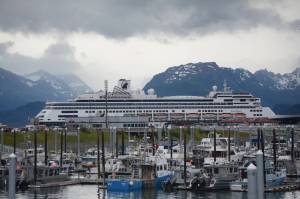 <span class="neFMT neFMT_PhotoCredit">Photo by Michael Armstrong/Homer News</span>                                The Holland America cruise ship Zaandam towers over the Homer Harbor on Tuesday, July 24 at the Deep Water Dock in Homer. The Zaandam visits every other week in Homer during the summer.