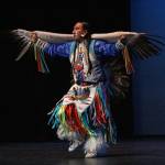 Larry Yazzi performs the Eagle Dance on Thursday, Sept. 6, 2018 in the Homer High School Mariner Theatre in Homer, Alaska. Yazzis group, the Native Pride Dancers, traveled from Minnesota to performs in several schools and venues on the Kenai Peninsula. Their visit was made possible by the Native Youth Community Project. (Photo by Megan Pacer/Homer News)