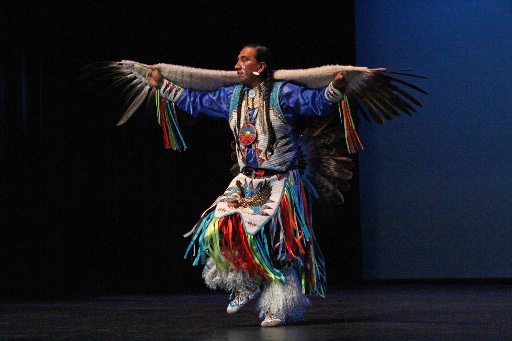 Larry Yazzi performs the Eagle Dance on Thursday, Sept. 6, 2018 in the Homer High School Mariner Theatre in Homer, Alaska. Yazzis group, the Native Pride Dancers, traveled from Minnesota to performs in several schools and venues on the Kenai Peninsula. Their visit was made possible by the Native Youth Community Project. (Photo by Megan Pacer/Homer News)